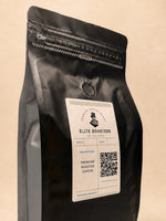 Close-up of the resealable zipper and freshness valve on an Elite Roasters dark roast bag 