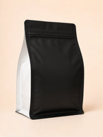 Rear view of the Elite Roasters light roast coffee bag with white side gusset 
