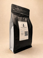 Three-quarter view of the Elite Roasters light roast coffee bag with white side gusset 