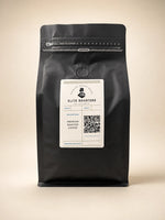 Elite Roasters of Atlanta medium roast coffee in the new black 1 lb bag with gold side gusset 
