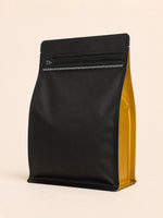 Rear view of the Elite Roasters medium roast coffee bag with gold side gusset 