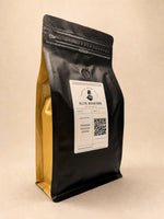 Three-quarter view of the Elite Roasters medium roast coffee bag with gold side gusset 